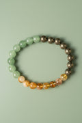 Multicolored beaded bracelet on a textured surface