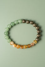 Multicolored beaded bracelet on a textured surface